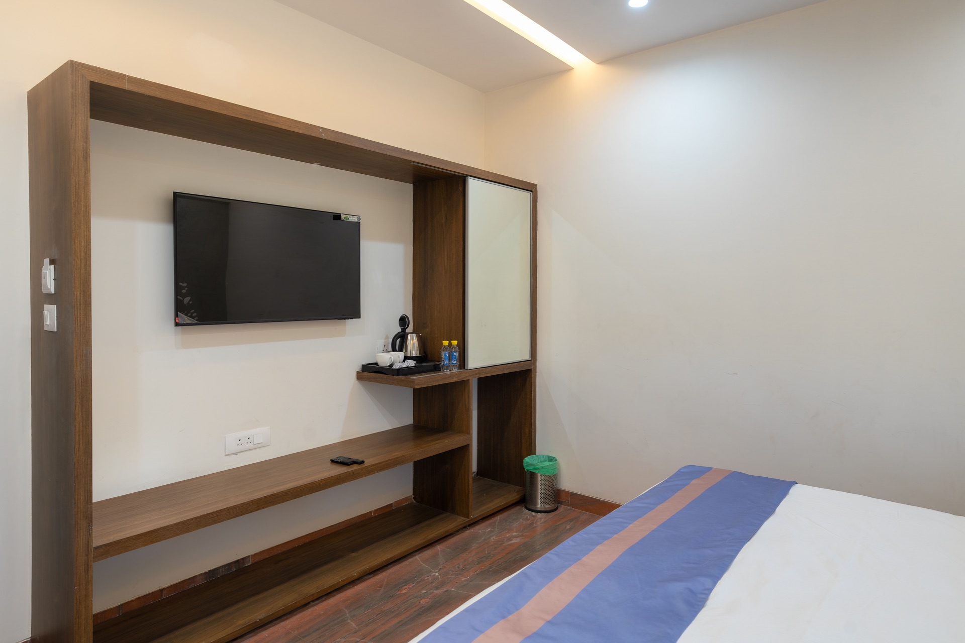 The Deluxe Room's desk, mirror and wardrobe