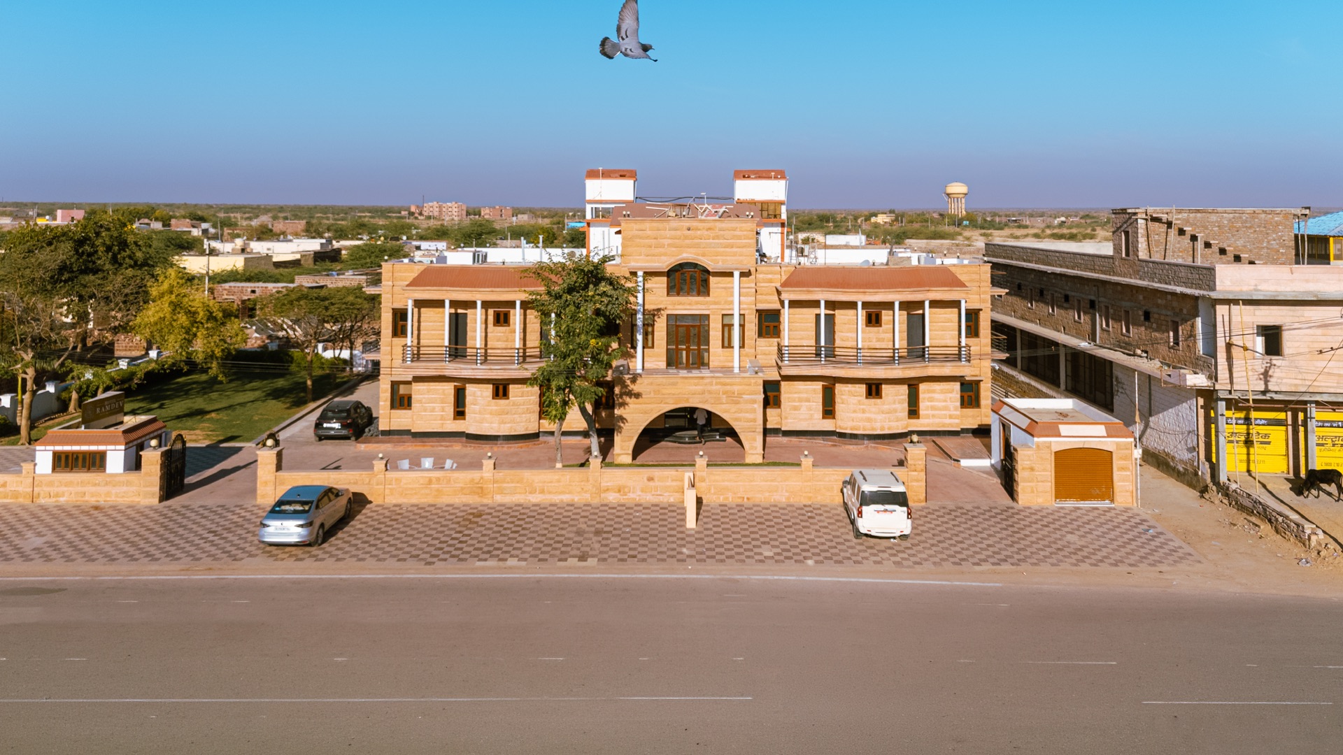 Hotel Ramdev from above — carved sandstone facade on the Pokhran road