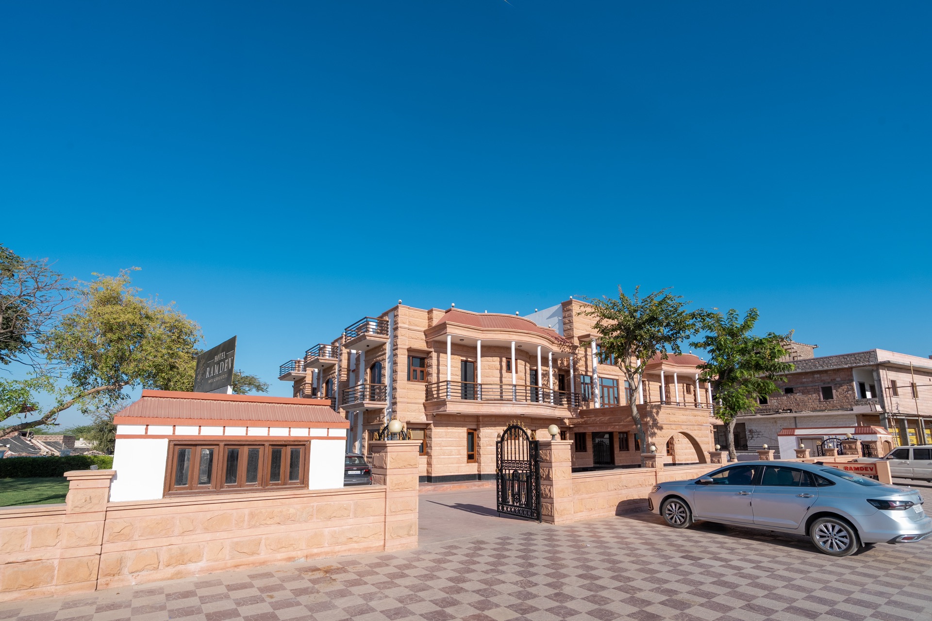 The sandstone facade and gate of Hotel Ramdev