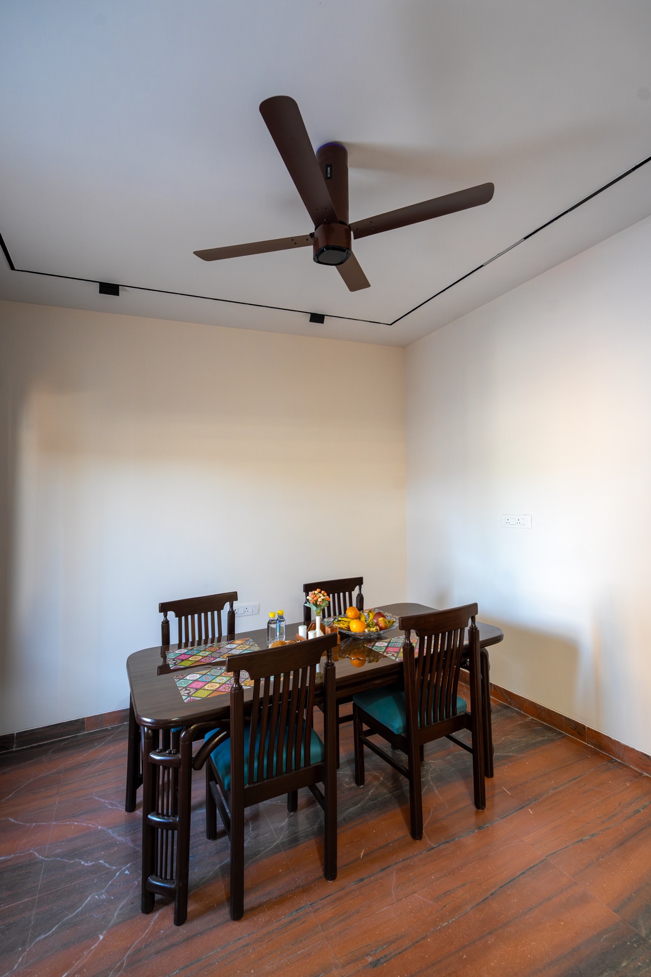 The Suite Room's own dining table, laid for four