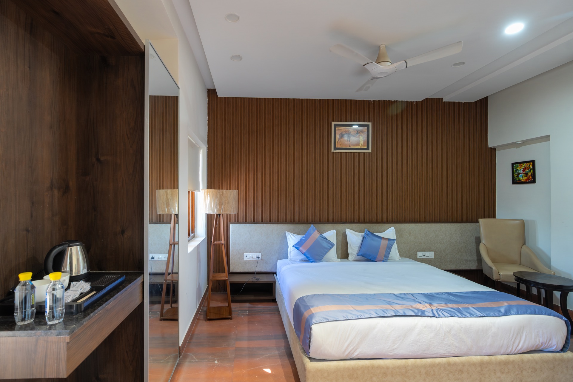 Superior Room at Hotel Ramdev — double bed with a seating area